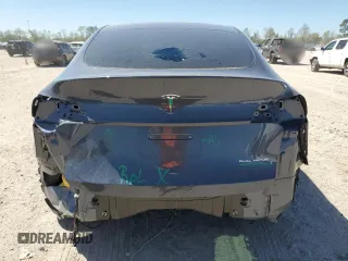 2023 Tesla Model Y Long Range z VIN 7SAYGDEE8PA185193, wystawiony jako Copart lot #48706215 z przebiegiem 10 451 mil mil oraz Szkoda całkowita • Salvage title. Historia ofert i sprzedaży dostępna na DreamBid. Obrazek 6.
