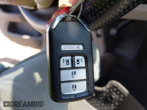 2016 Honda Odyssey SE with VIN 5FNRL5H33GB125693, listed as a IAAI auction lot 41994036 with 163,617 mi miles and . Bid and sale history available at DreamBid. Image 11.
