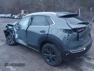 2023 Mazda CX-30 S Carbon Edition with VIN 3MVDMBCM5PM545150, listed as a IAAI auction lot 41104881 with 30,459 mi miles and . Bid and sale history available at DreamBid. Image 3.