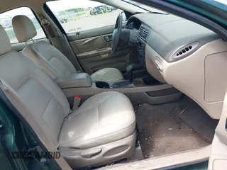 2000 Mercury Sable LS Premium z VIN 1MEFM55S4YA648211, wystawiony jako IAAI lot #42354578 z przebiegiem 72 686 mil mil oraz . Historia ofert i sprzedaży dostępna na DreamBid. Obrazek 5.