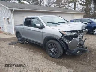 2020 Honda Ridgeline Sport with VIN 5FPYK3F13LB023123, listed as a IAAI auction lot 41694273 with 51,934 mi miles and . Bid and sale history available at DreamBid. Image 1.