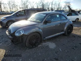 2012 Volkswagen Beetle 2.0T Turbo w/Sun/Snd/Nav PZEV with VIN 3VWVA7AT9CM663246, listed as a Copart auction lot 86379894 with 145,326 mi miles and Salvage Title. Bid and sale history available at carsss.com. Image 1.