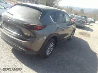 2023 Mazda CX-5 2.5 S Carbon Edition with VIN JM3KFBCM5P0190753, listed as a IAAI auction lot 41730043 with 57,539 mi miles. Bid and sale history available at carsss.com. Image 4.