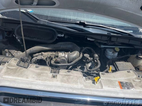2020 Ford Transit Cargo with VIN 1FTBW3X82LKB36188, listed as a IAAI auction lot 42828633 with 71,589 mi miles and . Bid and sale history available at DreamBid. Image 4.