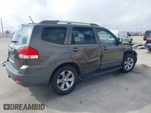 2009 Kia Borrego LX with VIN KNDJJ741995016159, listed as a IAAI auction lot 41498450 with 164,520 mi miles. Bid and sale history available at carsss.com. Image 4.