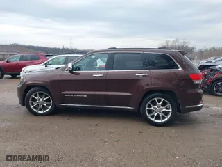 2014 Jeep Grand Cherokee Summit with VIN 1C4RJFJGXEC572752, listed as a IAAI auction lot 41905142 with 205,858 mi miles. Bid and sale history available at carsss.com. Image 14.