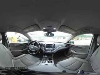 2014 Chevrolet Impala LT with VIN 1G1115SL7EU143042, listed as a IAAI auction lot 42445383 with 57,457 mi miles and . Bid and sale history available at DreamBid. Image 18.