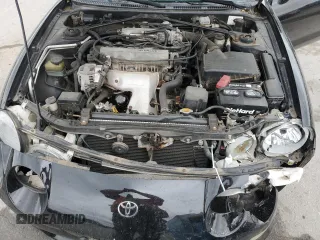 1996 Toyota Celica GT z VIN JT5FG02T3T0031613, wystawiony jako Copart lot #58410225 z przebiegiem 124 899 mil mil oraz Szkoda całkowita • Salvage title. Historia ofert i sprzedaży dostępna na DreamBid. Obrazek 11.