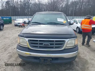 2000 Ford F-150 XL with VIN 1FTZX0725YKA09559, listed as a IAAI auction lot 41810954 with Not provided miles and . Bid and sale history available at DreamBid. Image 12.