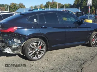 2021 BMW X4 M40i with VIN 5UX2V5C05M9H59295, listed as a Copart auction lot 71312963 with 31,050 mi miles. Bid and sale history available at carsss.com. Image 3.