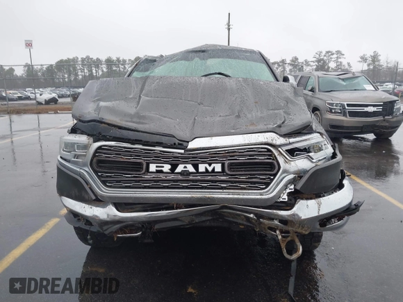 2021 Ram 1500 Limited with VIN 1C6SRFHT4MN588369, listed as a IAAI auction lot 41553981 with 51,293 mi miles and . Bid and sale history available at DreamBid. Image 12.