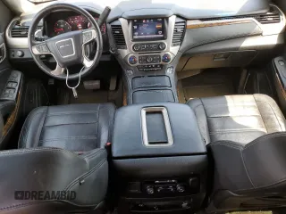 2015 GMC Yukon XL Denali with VIN 1GKS1JKJ1FR295572, listed as a Copart auction lot 65498084 with 150,167 mi miles and Clean Title. Bid and sale history available at carsss.com. Image 8.