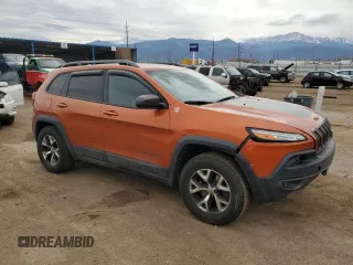 2016 Jeep Cherokee Trailhawk with VIN 1C4PJMBS2GW132928, listed as a Copart auction lot 50914955 with 156,993 mi miles and Salvage Title. Bid and sale history available at DreamBid. Image 4.