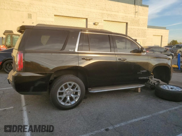 2015 GMC Yukon SLT with VIN 1GKS1BKC9FR144289, listed as a Copart auction lot 42179675 with 122,807 mi miles and Salvage Title. Bid and sale history available at carsss.com. Image 3.