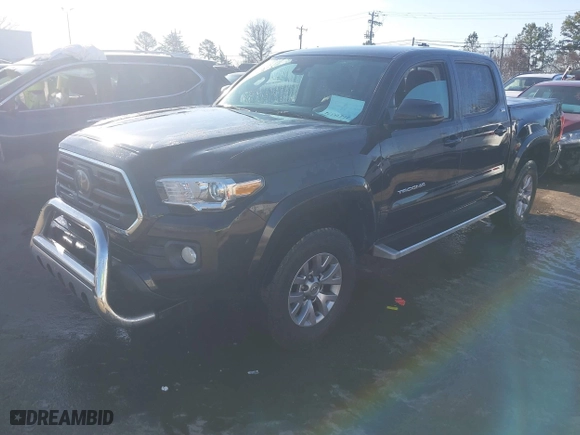2018 Toyota Tacoma SR5 with VIN 5TFAZ5CNXJX057538, listed as a IAAI auction lot 41435574 with 125,869 mi miles. Bid and sale history available at carsss.com. Image 17.