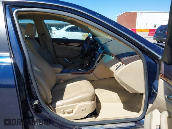 2008 Cadillac CTS AWD z VIN 1G6DH577980158801, wystawiony jako IAAI lot #41805061 z przebiegiem 99 579 mil mil oraz . Historia ofert i sprzedaży dostępna na DreamBid. Obrazek 5.