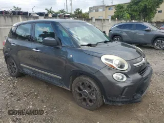 2015 FIAT 500L Urbana Trekking with VIN ZFBCFADH1FZ036613, listed as a Copart auction lot 44521745 with 77,583 mi miles and Salvage Title. Bid and sale history available at DreamBid. Image 4.