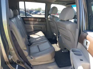2009 Honda Pilot EX-L with VIN 5FNYF48539B035820, listed as a IAAI auction lot 41942149 with 242,463 mi miles. Bid and sale history available at carsss.com. Image 8.