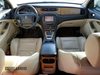 2005 Jaguar S-Type with VIN SAJWA03V451N43191, listed as a Copart auction lot 88491545 with 121,973 mi miles and Salvage Title. Bid and sale history available at DreamBid. Image 8.