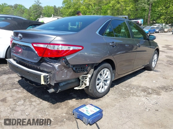 2016 Toyota Camry XLE with VIN 4T4BF1FK4GR557276, listed as a IAAI auction lot 42049650 with 117,529 mi miles and . Bid and sale history available at carsss.com. Image 4.