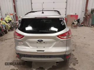 2014 Ford Escape SE z VIN 1FMCU9GX1EUD67624, wystawiony jako IAAI lot #41986362 z przebiegiem 79 921 mil mil oraz . Historia ofert i sprzedaży dostępna na DreamBid. Obrazek 16.