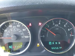 2018 Jeep Wrangler JK Unlimited Sport S with VIN 1C4BJWDG5JL926703, listed as a IAAI auction lot 41382629 with 66,567 mi miles. Bid and sale history available at carsss.com. Image 7.