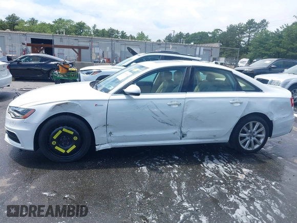 2014 Audi A6 Prestige with VIN WAUHGAFCXEN091050, listed as a IAAI auction lot 42524560 with 169,575 mi miles and . Bid and sale history available at DreamBid. Image 14.