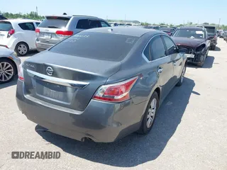 2015 Nissan Altima S with VIN 1N4AL3AP0FN324897, listed as a IAAI auction lot 41983678 with 184,042 mi miles and . Bid and sale history available at DreamBid. Image 4.