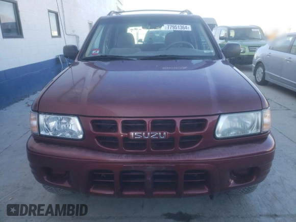 2002 Isuzu Rodeo S with VIN 4S2DM58W824313096, listed as a Copart auction lot 77951364 with 127,470 mi miles and Salvage Title. Bid and sale history available at DreamBid. Image 5.