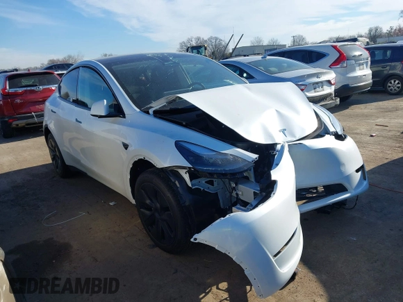 2025 Tesla Model Y Long Range with VIN 7SAYGDED9SA342374, listed as a IAAI auction lot 41663085 with 4,115 mi miles and . Bid and sale history available at DreamBid. Image 12.