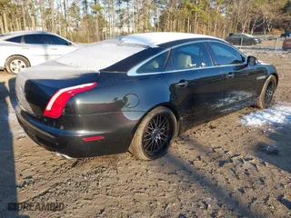 2012 Jaguar XJ with VIN SAJWA2GB0CLV25378, listed as a IAAI auction lot 41416644 with 90,582 mi miles. Bid and sale history available at carsss.com. Image 4.