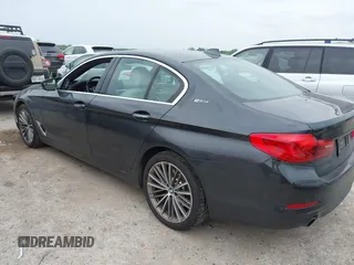 2018 BMW 5 Series 530e with VIN WBAJA9C55JB033575, listed as a IAAI auction lot 42067380 with 111,902 mi miles and . Bid and sale history available at DreamBid. Image 3.