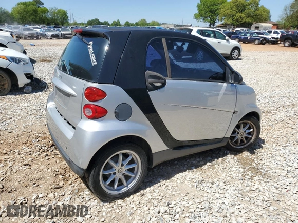 2009 Smart fortwo Pure with VIN WMEEJ31X49K224990, listed as a Copart auction lot 52111335 with 72,317 mi miles and Salvage Title. Bid and sale history available at carsss.com. Image 3.
