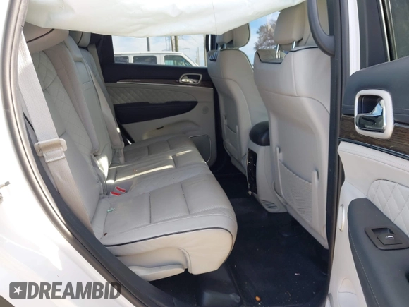 2018 Jeep Grand Cherokee Summit with VIN 1C4RJEJG3JC394624, listed as a IAAI auction lot 41412939 with 80,180 mi miles and . Bid and sale history available at DreamBid. Image 8.