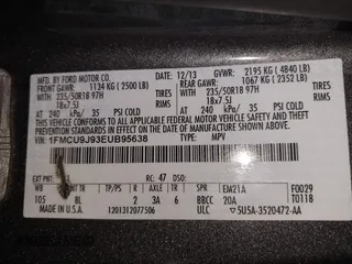 2014 Ford Escape Titanium with VIN 1FMCU9J93EUB95638, listed as a IAAI auction lot 41481089 with 182,258 mi miles. Bid and sale history available at carsss.com. Image 9.