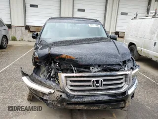 2012 Honda Ridgeline RTL z VIN 5FPYK1F5XCB455246, wystawiony jako Copart lot #52871925 z przebiegiem 179 755 mil mil oraz Szkody całkowita. Historia ofert i sprzedaży dostępna na DreamBid. Obrazek 5.
