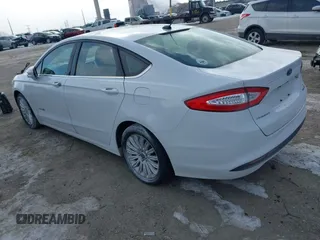 2014 Ford Fusion SE Hybrid with VIN 3FA6P0LU4ER243067, listed as a IAAI auction lot 41378720 with 129,625 mi miles. Bid and sale history available at carsss.com. Image 3.