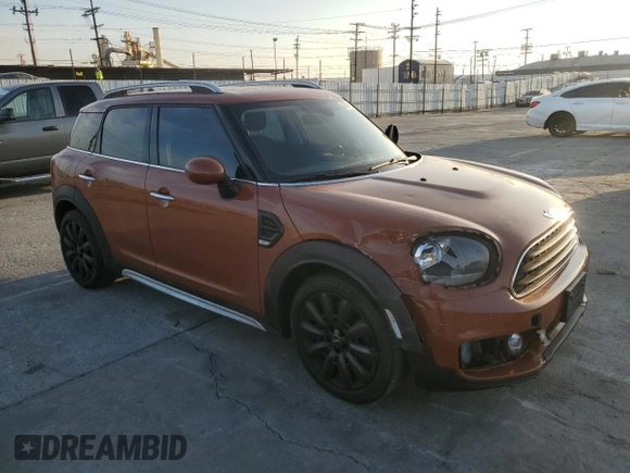 2017 MINI Countryman Cooper with VIN WMZYS7C32H3E07181, listed as a Copart auction lot 83219184 with 75,046 mi miles and Salvage title. Bid and sale history available at DreamBid. Image 4.