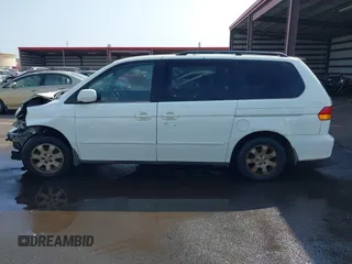 2002 Honda Odyssey EX z VIN 2HKRL18632H556791, wystawiony jako IAAI lot #41562553 z przebiegiem 222 976 mil mil oraz . Historia ofert i sprzedaży dostępna na DreamBid. Obrazek 15.