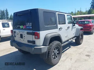 2008 Jeep Wrangler Unlimited X with VIN 1J4GA39148L596727, listed as a IAAI auction lot 42632457 with 175,000 mi miles and . Bid and sale history available at DreamBid. Image 4.
