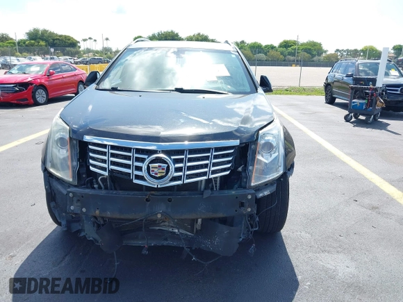 2013 Cadillac SRX Premium Collection with VIN 3GYFNEE34DS535613, listed as a IAAI auction lot 42336365 with 106,426 mi miles and . Bid and sale history available at DreamBid. Image 6.
