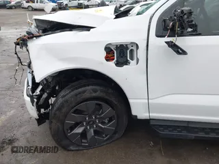 2023 Ford F-150 Lightning Pro with VIN 1FT6W1EV8PWG05765, listed as a IAAI auction lot 41461450 with Not Provided miles and . Bid and sale history available at DreamBid. Image 12.