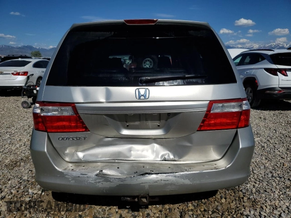 2007 Honda Odyssey EX-L z VIN 5FNRL38647B028078, wystawiony jako Copart lot #56208005 z przebiegiem 192 000 mil mil oraz Szkoda całkowita • Salvage title. Historia ofert i sprzedaży dostępna na DreamBid. Obrazek 6.