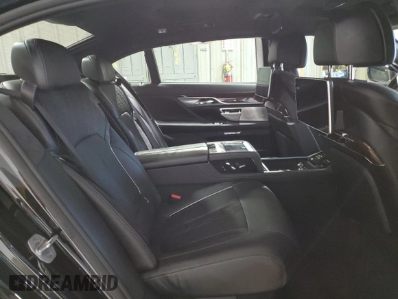 2016 BMW 7 Series 750i with VIN WBA7F0C5XGGL99017, listed as a Copart auction lot 84934504 with 0 mi miles and Salvage Title. Bid and sale history available at carsss.com. Image 11.