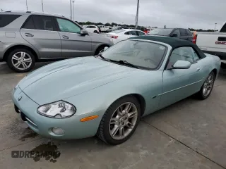 2002 Jaguar XK with VIN SAJDA42C52NA27475, listed as a Copart auction lot 74382624 with 68,629 mi miles and Salvage Title. Bid and sale history available at DreamBid. Image 1.