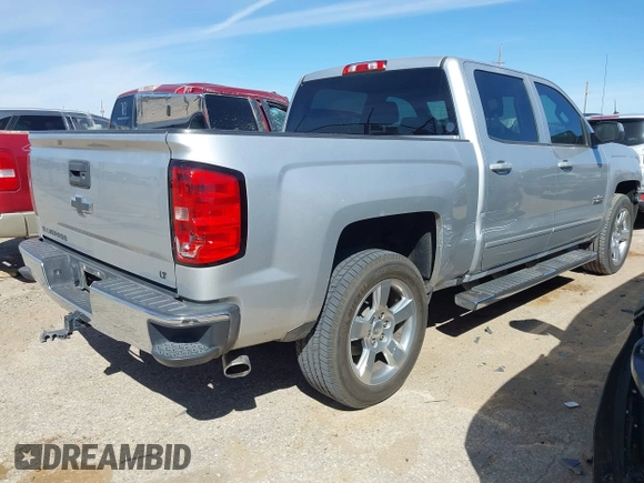 2018 Chevrolet Silverado 1500 LT with VIN 3GCPCREC5JG506529, listed as a IAAI auction lot 41834983 with 83,623 mi miles and . Bid and sale history available at DreamBid. Image 4.