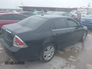 2009 Ford Fusion SEL with VIN 3FAHP08Z79R214150, listed as a IAAI auction lot 42071253 with 181,144 mi miles. Bid and sale history available at carsss.com. Image 4.