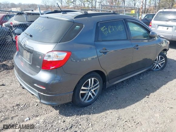 2009 Toyota Matrix S with VIN 2T1LE40E39C001020, listed as a IAAI auction lot 41801991 with 999,999 mi miles. Bid and sale history available at carsss.com. Image 4.
