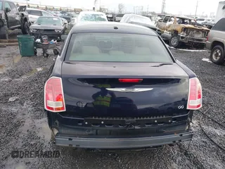 2012 Chrysler 300 with VIN 2C3CCAAG7CH142422, listed as a IAAI auction lot 41555202 with 134,864 mi miles and . Bid and sale history available at DreamBid. Image 16.