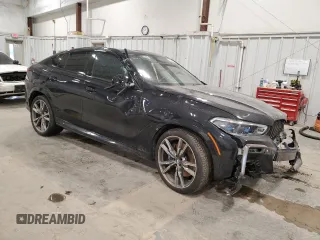 2021 BMW X6 M50i with VIN 5UXCY8C05M9E21862, listed as a Copart auction lot 86329064 with 0 mi miles and Salvage Title. Bid and sale history available at carsss.com. Image 4.